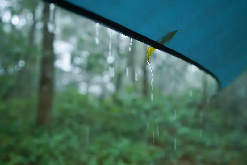 camping in the rain with tarp